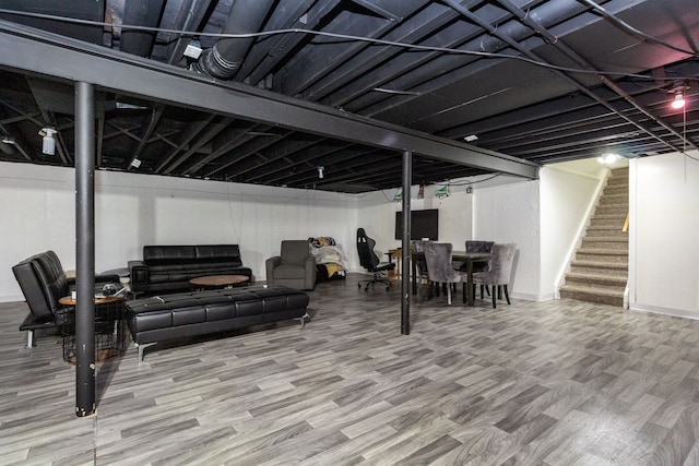 basement featuring hardwood / wood-style floors