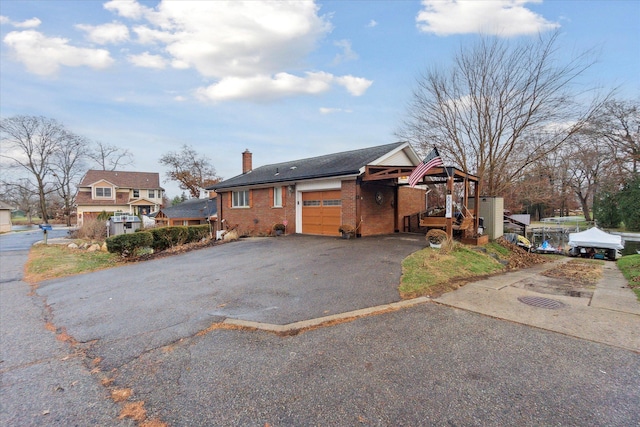 view of property exterior with a garage