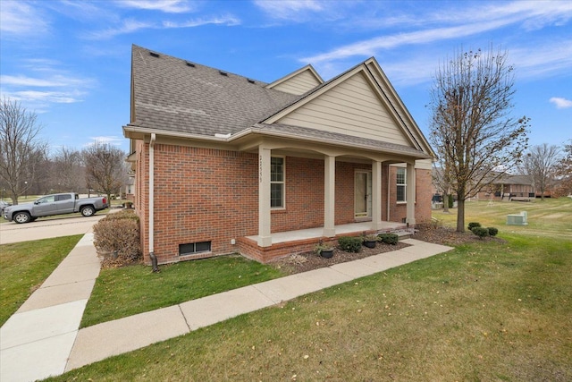 view of front of house featuring a porch and a front yard