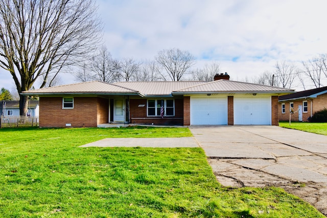 single story home featuring a garage and a front yard