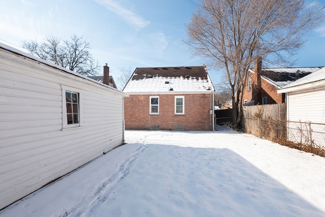 view of snow covered property