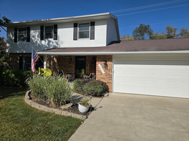 front of property with a garage