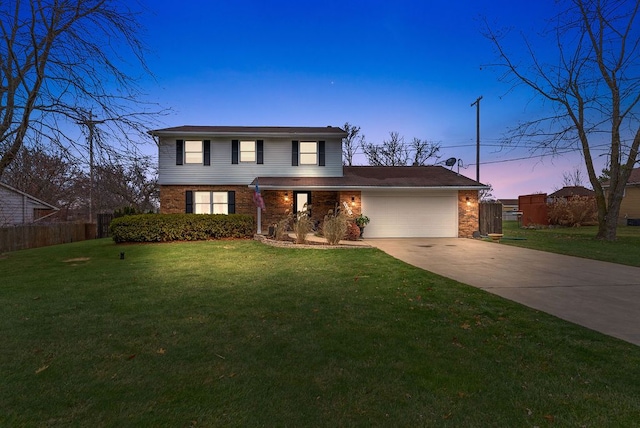 front facade with a garage and a lawn