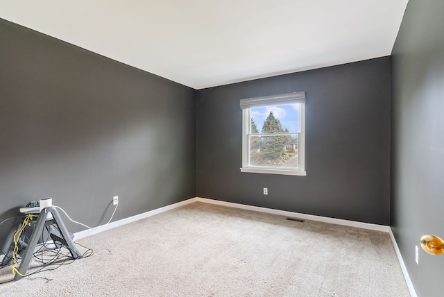 empty room with carpet flooring