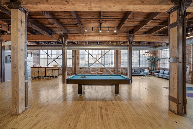 recreation room with wood ceiling, plenty of natural light, wood-type flooring, and pool table