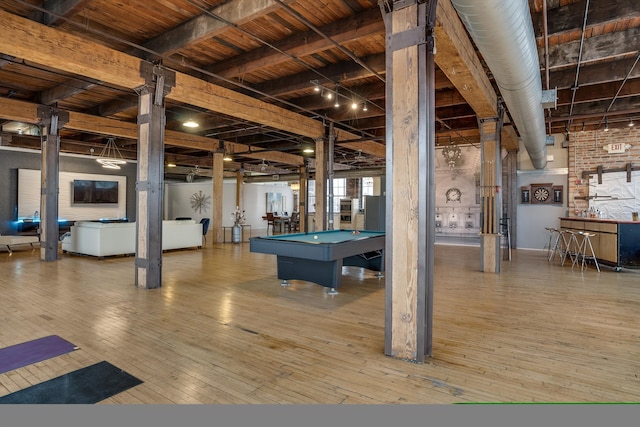 game room featuring beamed ceiling, wood-type flooring, wooden ceiling, and billiards