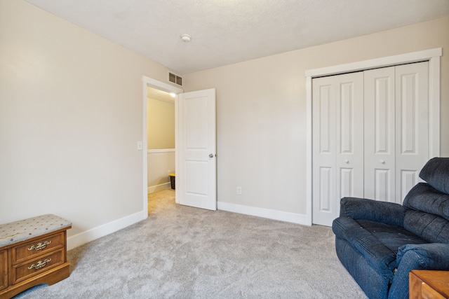 sitting room with light carpet