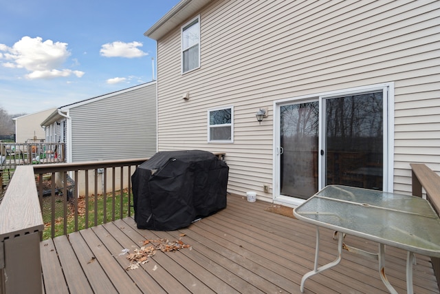 wooden deck with area for grilling