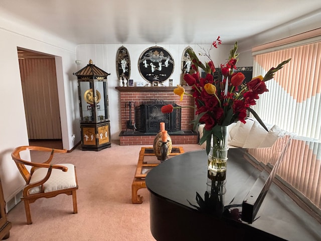 living room with carpet flooring and a fireplace