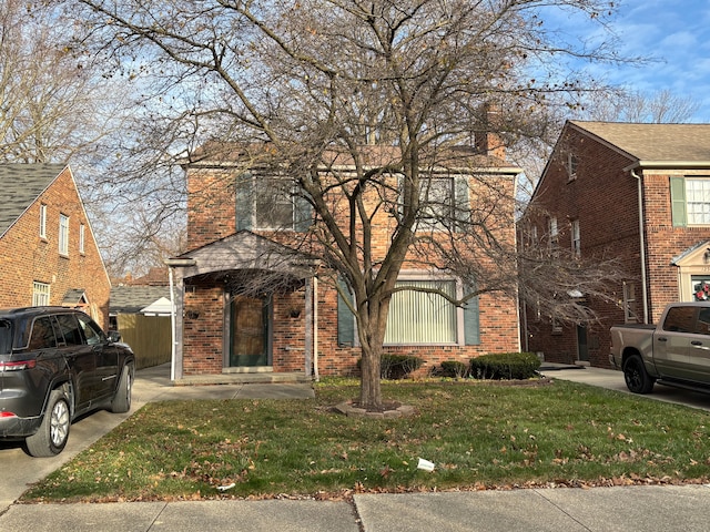 view of front of property with a front lawn