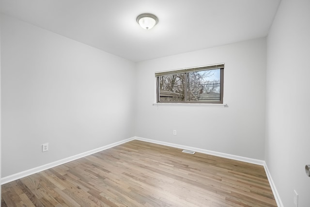 empty room featuring light hardwood / wood-style floors