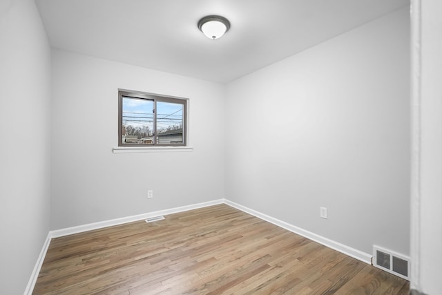 empty room featuring light hardwood / wood-style floors