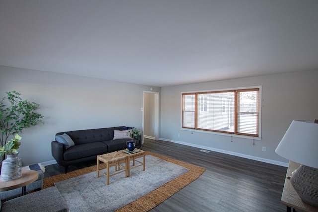 living room featuring dark hardwood / wood-style floors