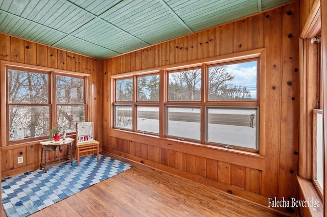 unfurnished sunroom featuring wooden ceiling