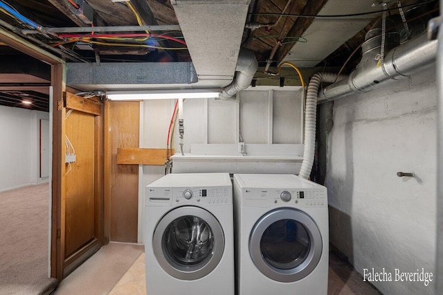 washroom with washer and clothes dryer