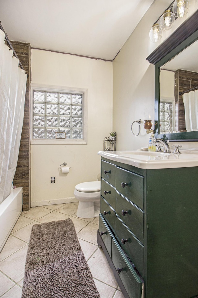 full bathroom with tile patterned flooring, vanity, shower / bath combination with curtain, and toilet