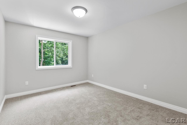 view of carpeted spare room