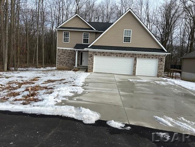 front facade with a garage