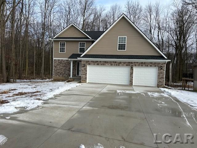 front of property featuring a garage