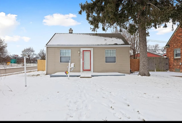 view of snow covered property