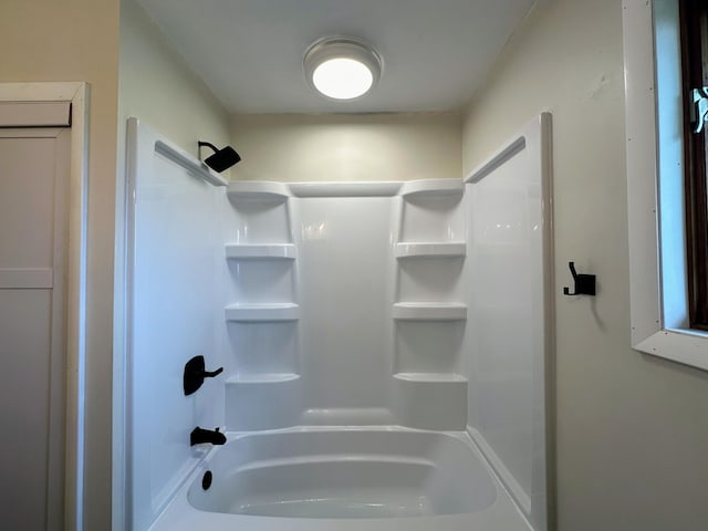 bathroom with shower / bathtub combination