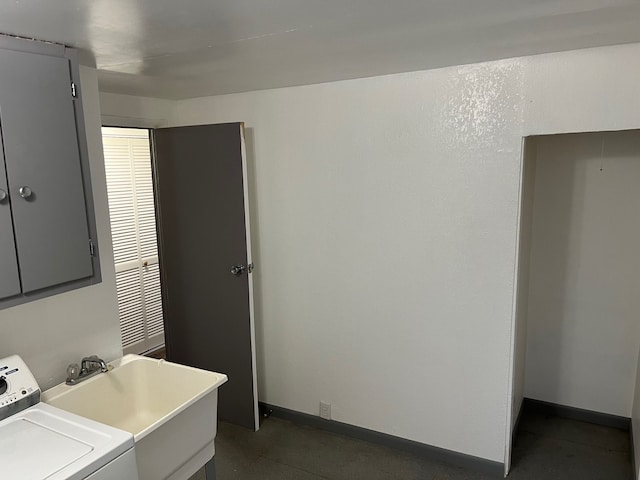 laundry area with washer / dryer and sink