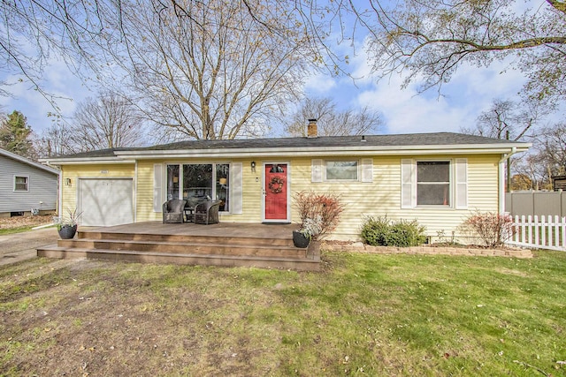 ranch-style house with a front lawn and a garage