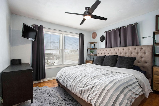 bedroom with light hardwood / wood-style flooring and ceiling fan