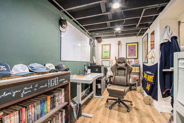 office space with wood-type flooring