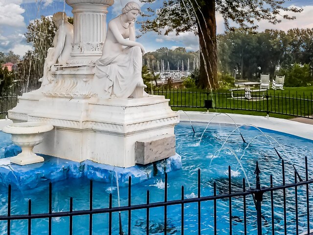 view of pool featuring a yard