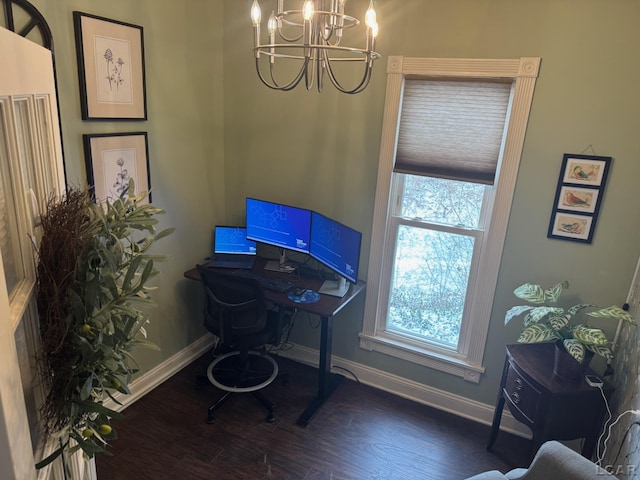 home office featuring dark hardwood / wood-style floors and a notable chandelier