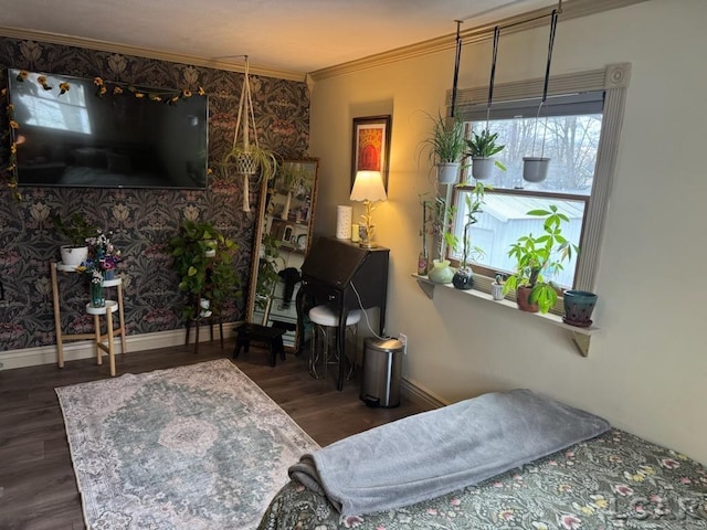 bedroom featuring dark hardwood / wood-style floors and crown molding