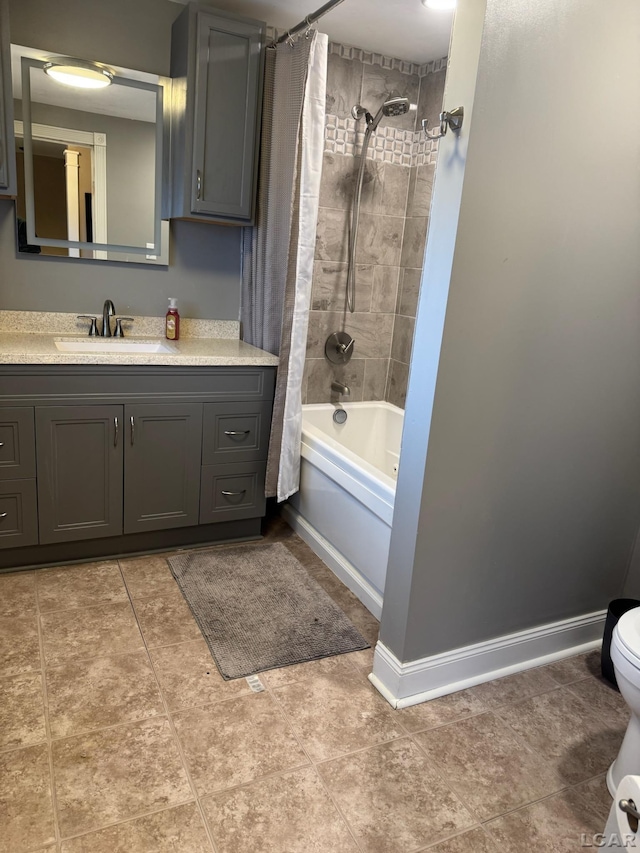 full bathroom with vanity, toilet, and shower / bath combo with shower curtain