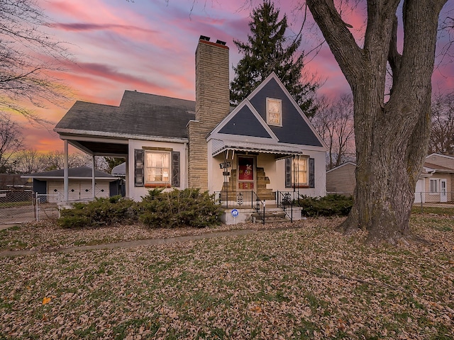 view of front of property featuring covered porch