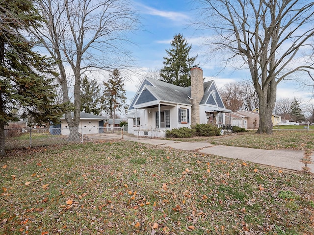 view of front of home with a porch and a front yard