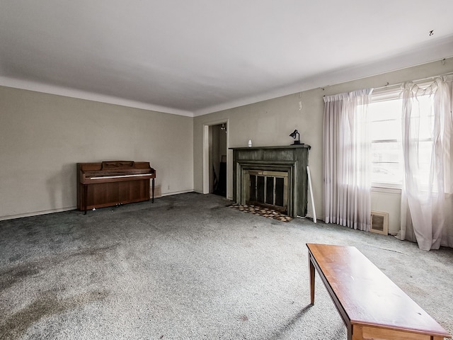 unfurnished living room with carpet flooring