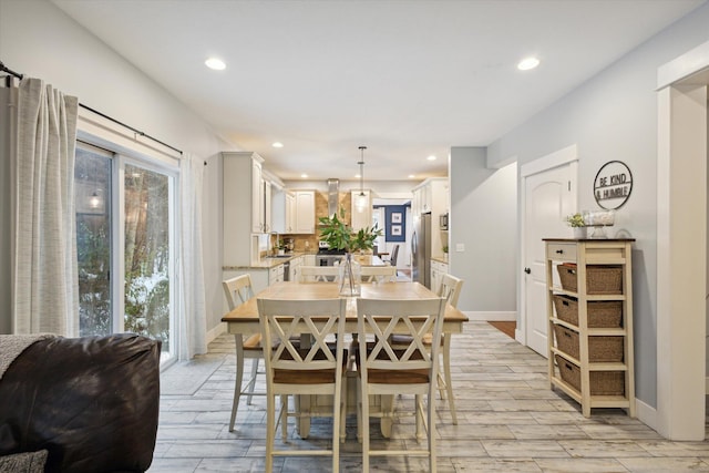 dining room with light wood-type flooring