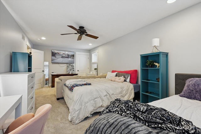 bedroom with light colored carpet and ceiling fan