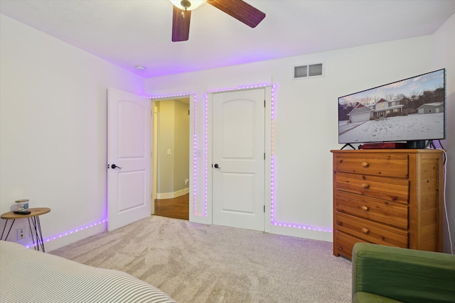 carpeted bedroom featuring ceiling fan