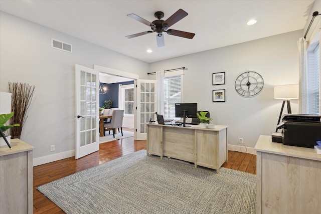 office with hardwood / wood-style floors, ceiling fan, and french doors