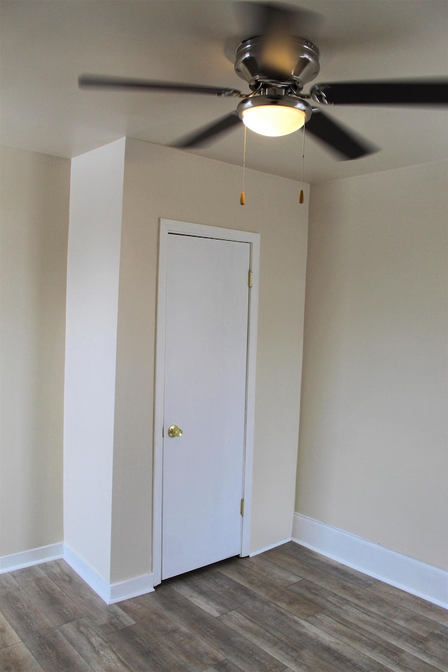 unfurnished room with ceiling fan and hardwood / wood-style floors