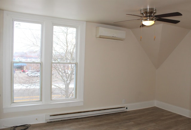 unfurnished room featuring dark hardwood / wood-style floors, ceiling fan, a wall mounted AC, and a baseboard heating unit