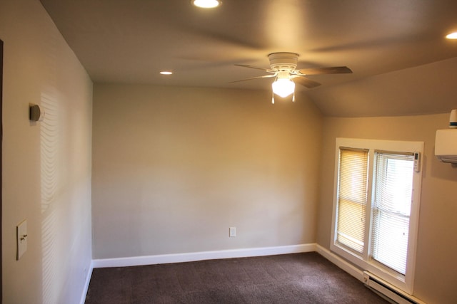 carpeted empty room with ceiling fan, lofted ceiling, and a baseboard heating unit