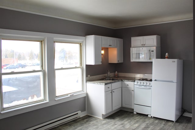 kitchen featuring white cabinetry, sink, baseboard heating, white appliances, and light wood-type flooring