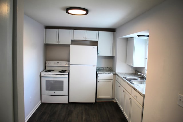 kitchen with light stone countertops, dark hardwood / wood-style flooring, white appliances, sink, and white cabinets