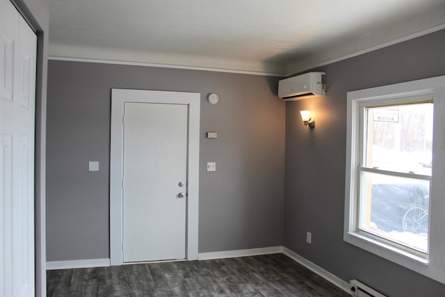 unfurnished room featuring a wall mounted air conditioner, a baseboard radiator, and dark wood-type flooring