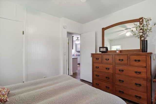 bedroom featuring ceiling fan and dark hardwood / wood-style floors