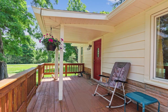 wooden terrace featuring a porch