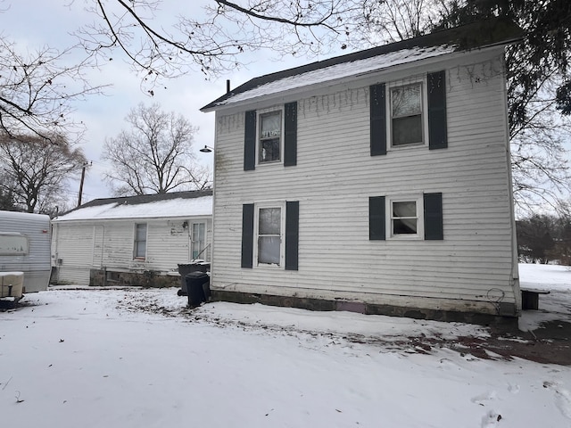 view of snow covered house