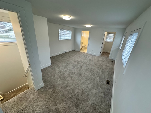 spare room with carpet floors